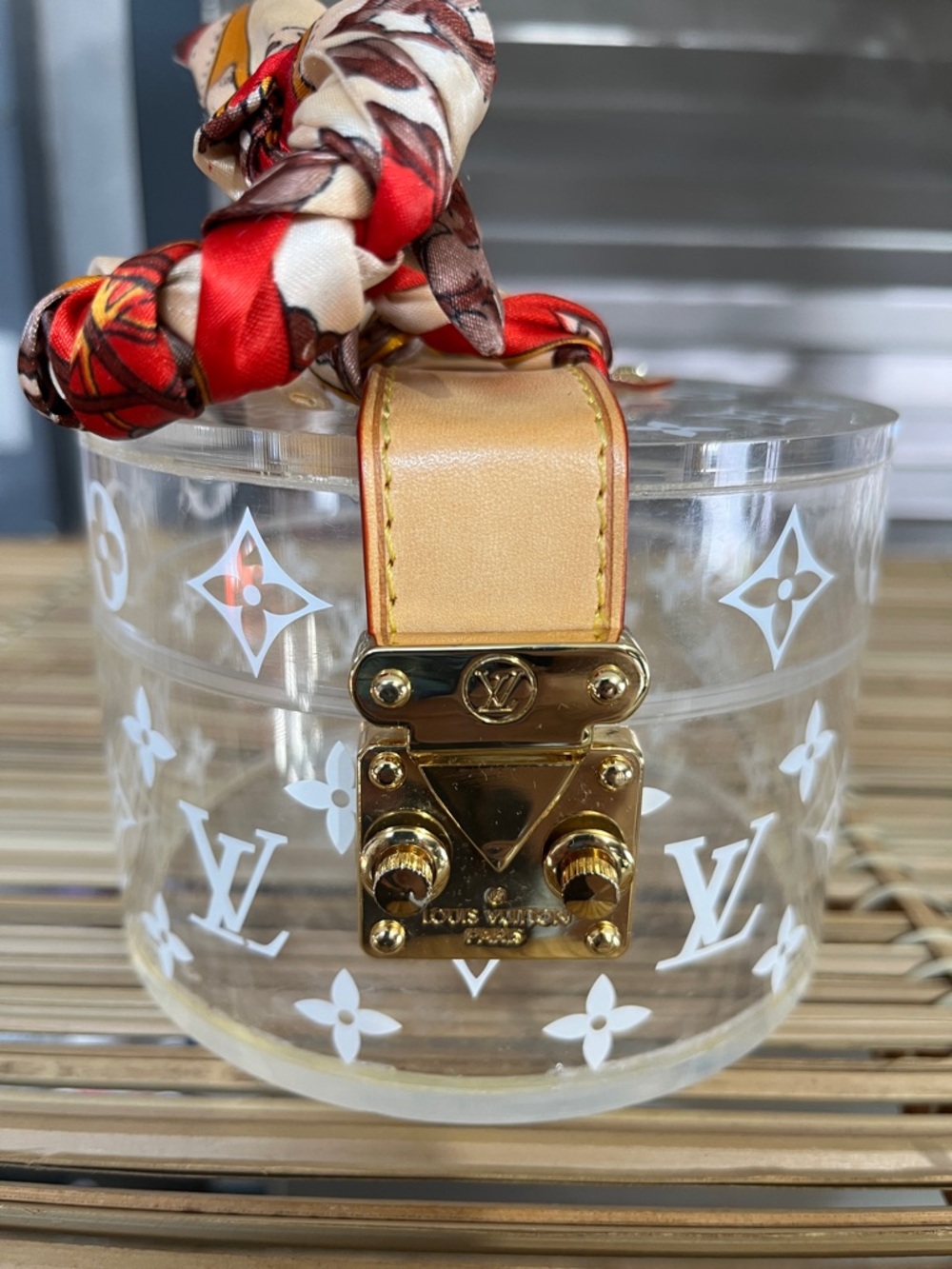 Louis Vuitton Clear Monogram Bucket Bag with Tan Trim and Red Scarf